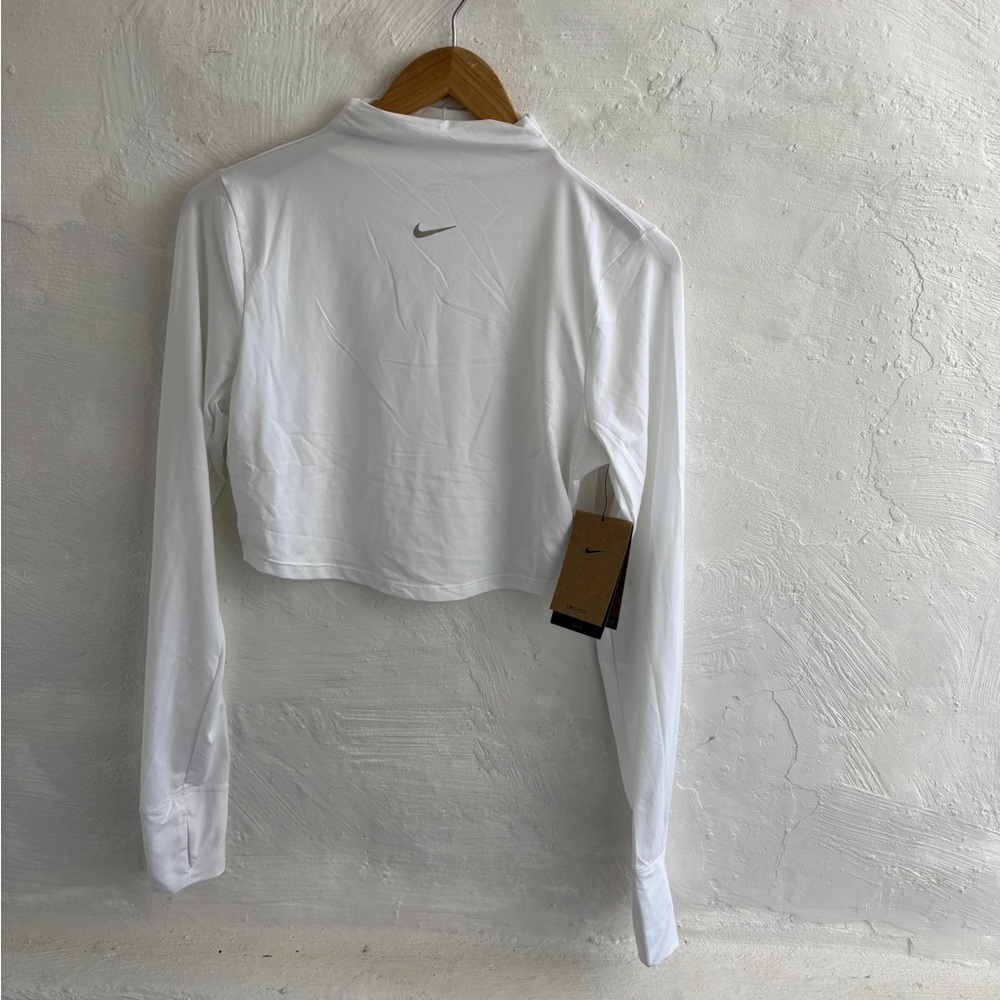 white Nike Dri-FIT One Luxe
Women's Long-Sleeve Cropped Top - Picture 6 of 12